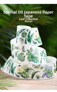 Macro detail of tropical leaf washi tape with special oil printing on a wooden surface