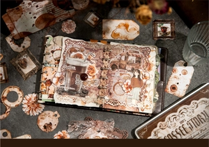 Vintage coffee theme scrapbook kit with stickers and notes in a retro metal storage box