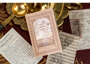 Close-up of Old Manuscript vintage scrapbooking paper with antique letters and music sheets