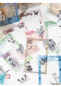 Detail of vintage PET collage stickers with floral and butterfly patterns for scrapbooking