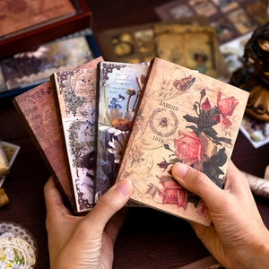 Vintage scrapbooking material set with retro floral and butterfly themed mini notebooks