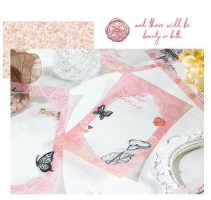 Detail of vintage PET butterfly stickers and decorative collage cards for DIY journaling