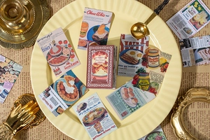 Detailed view of vintage aesthetic food stickers with retro mid-century food advertisements