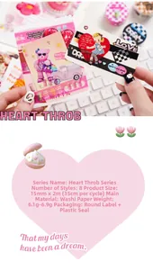 Close-up of 15mm washi tape with cute pink bear and heart patterns for scrapbooking