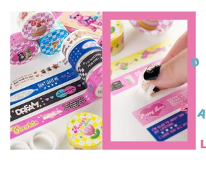 Detail showing the peeling of cute heart-themed washi tape for journal decorating