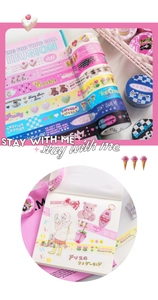 Detail of cute Washi tape set with desserts and pets for creative DIY scrapbooking