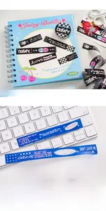 Detail of cute INS style washi tape sets with checkerboard and cherry patterns for journals
