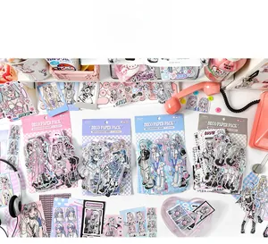 Flat lay of anime girl stickers for journaling including pink, blue, and purple packs