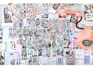 Flat lay of Y2K anime girl stickers in pastel tones with a vintage pink phone prop