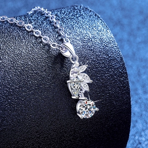 S925 sterling silver moissanite necklace with pearls and marquise stones on a stand