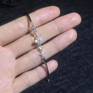 S925 sterling silver adjustable bangle with sparkling four-pointed star and zircon stones
