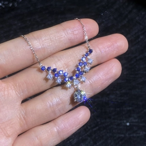 S925 sterling silver V-shape necklace with blue and white moissanite stones and main round gem