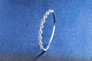 Detailed view of S925 silver pig nose bracelet with sparkling pavé moissanite stones
