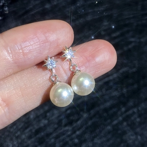 Elegant S925 silver moissanite earrings with a star stud and hanging white pearl