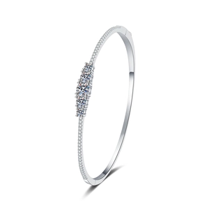 Minimalist S925 sterling silver bangle with five round-cut moissanite stones and pave setting