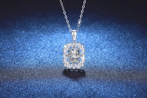 Close-up of S925 silver necklace with radiant rectangular moissanite and floral halo