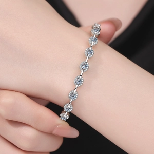 Moissanite S925 sterling silver bracelet featuring sparkling pave circular links on wrist