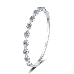 S925 sterling silver moissanite bracelet with round halo link design on white background
