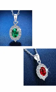 Close-up of vintage S925 silver pendants with emerald and ruby gemstones in pavé setting
