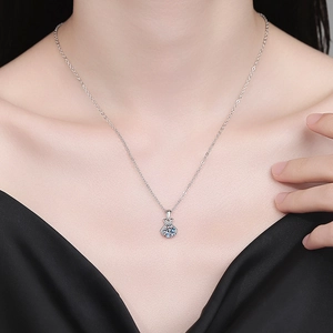 S925 silver lucky bag necklace with 1 carat moissanite pendant shown on a model