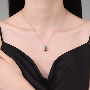 Elegant S925 silver necklace with rectangular red gemstone pendant on female model