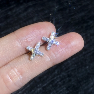 Elegant S925 sterling silver X-shaped moissanite stud earrings with brilliant starfire effect