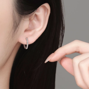 S925 sterling silver hoop earrings with beaded texture on model for elegant daily look