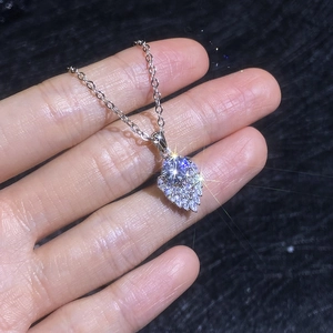 Elegant S925 sterling silver necklace featuring a teardrop pendant with 1ct moissanite stone