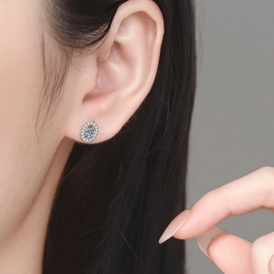 Elegant S925 sterling silver oval moissanite stud earrings for women on model