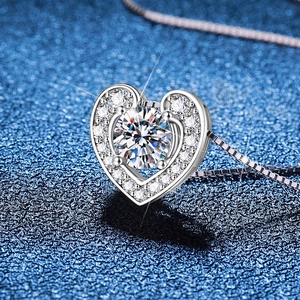 925 silver heart necklace featuring a 1ct round moissanite center stone and halo diamonds