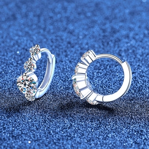 Elegant S925 sterling silver huggie earrings featuring sparkling moissanite stones