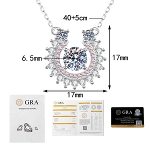 Detailed view of horse-shoe pendant with GRA certification report showing diamond quality