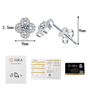 Detailed view of moissanite clover stud earrings with GRA certification set and documents