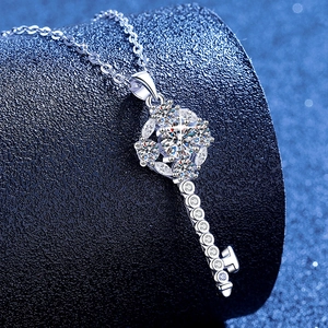 S925 sterling silver sunflower key pendant necklace with sparkling moissanite on black stand
