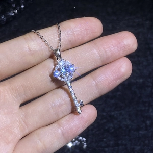 Luxurious S925 sterling silver sun flower key pendant necklace with moissanite stones