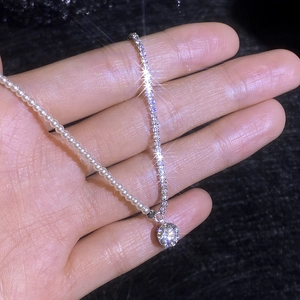 S925 silver necklace featuring elegant pearls and sparkling pave chain with round pendant