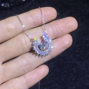 Elegant S925 sterling silver horseshoe necklace with sparkling dancing moissanite pendant