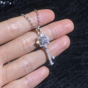 Elegant S925 sterling silver star-key necklace with sparkling 1ct Moissanite pendant