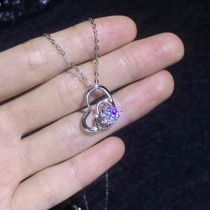 S925 sterling silver heart pendant necklace with brilliant moissanite stone in hand