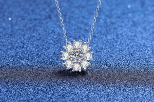 Macro shot of S925 sterling silver moissanite sunflower pendant with brilliant round-cut stones