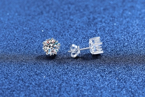 Macro shot of 925 sterling silver moissanite stud earrings with butterfly backs