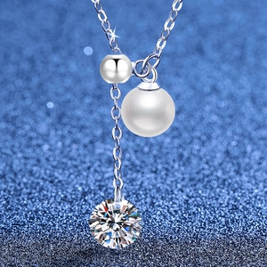 Elegant S925 sterling silver necklace featuring moissanite, pearl, and tassel pendant