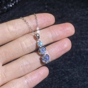 Classic S925 sterling silver necklace with three-stone moissanite pendant in vertical drop