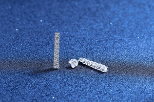 Close-up of S925 sterling silver drop earrings with eight brilliant round-cut moissanite stones