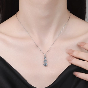 Classic S925 sterling silver necklace with three Moissanite stones on a delicate chain