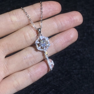 Moissanite key pendant necklace in 925 sterling silver with sparkling micro-pave stones