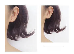 Comparison of 2.5mm and 3mm minimalist silver ball stud earrings on a model's ear