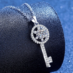 Luxurious S925 sterling silver key pendant necklace with 1 carat D color moissanite