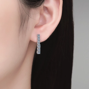 Elegant S925 sterling silver bar earrings with sparkling moissanite diamonds on earlobe