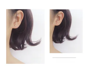 Detail showing 2.50mm and 3.00mm minimalist ball stud earrings in gold finish